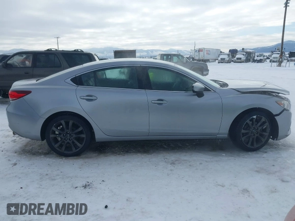 2014 Mazda Mazda6 i Touring with VIN JM1GJ1V62E1134427, listed as a IAAI auction lot 41550411 with 112,804 mi miles. Bid and sale history available at carsss.com. Image 13.