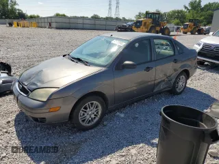2007 Ford Focus S with VIN 1FAHP34N27W328118, listed as a Copart auction lot 62638885 with 138,111 mi miles and Salvage title. Bid and sale history available at DreamBid. Image 1.