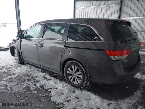 2016 Honda Odyssey SE with VIN 5FNRL5H32GB155946, listed as a IAAI auction lot 41590237 with 140,167 mi miles. Bid and sale history available at carsss.com. Image 3.
