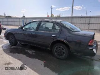1997 Nissan Maxima GXE with VIN JN1CA21D0VT201140, listed as a Copart auction lot 52230495 with 286,440 mi miles and Clean title. Bid and sale history available at DreamBid. Image 2.