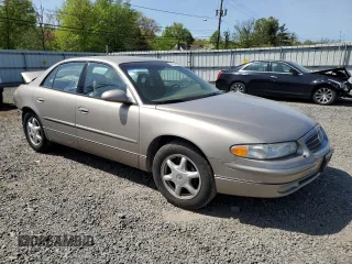 2002 Buick Regal LS z VIN 2G4WB55K421101234, wystawiony jako Copart lot #54744355 z przebiegiem Nie podano mil oraz Szkoda całkowita • Salvage title. Historia ofert i sprzedaży dostępna na DreamBid. Obrazek 4.