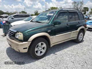 2002 Suzuki Grand Vitara JS z VIN JS3TE62V924151538, wystawiony jako Copart lot #58900085 z przebiegiem 130 514 mil mil oraz Szkoda całkowita • Salvage title. Historia ofert i sprzedaży dostępna na DreamBid. Obrazek 1.