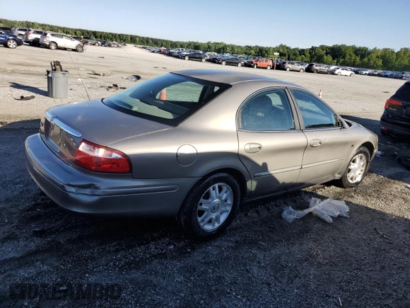 2004 Mercury Sable LS Premium with VIN 1MEHM55S84A614002, listed as a Copart auction lot 56582965 with 185,589 mi miles and Salvage title. Bid and sale history available at DreamBid. Image 3.