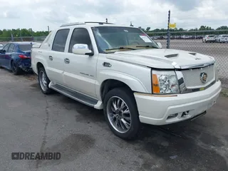 2004 Cadillac Escalade EXT z VIN 3GYEK62N04G123756, wystawiony jako IAAI lot #42361536 z przebiegiem 132 718 mil mil oraz . Historia ofert i sprzedaży dostępna na DreamBid. Obrazek 1.