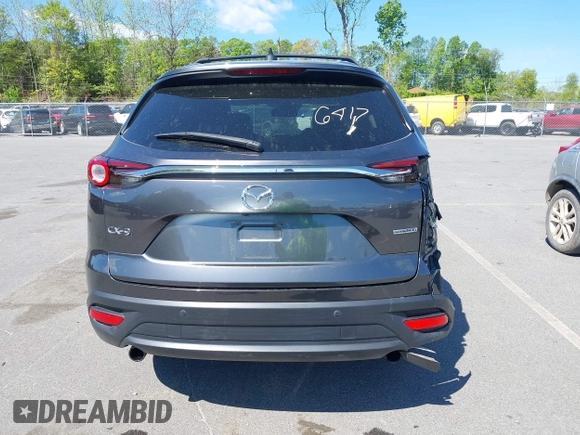 2021 Mazda CX-9 Touring with VIN JM3TCACY7M0503484, listed as a IAAI auction lot 42013262 with 63,777 mi miles and . Bid and sale history available at DreamBid. Image 17.