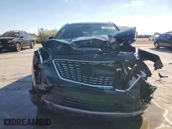2022 Cadillac XT4 FWD Premium Luxury с VIN 1GYFZCR48NF105892, выставлен на аукционе Copart как лот 76684034 с пробегом 44 400 миль миль и Списание • Salvage title. История ставок и продаж доступна на DreamBid. Изображение 5.