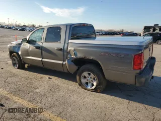 2008 Dodge Dakota SXT z VIN 1D7HW38K48S525576, wystawiony jako Copart lot #84548714 z przebiegiem 107 841 mil mil oraz Szkoda całkowita • Salvage title. Historia ofert i sprzedaży dostępna na DreamBid. Obrazek 2.
