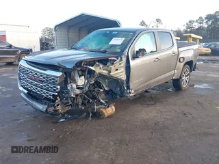 2021 GMC Canyon 4WD Denali with VIN 1GTG6EEN2M1123409, listed as a IAAI auction lot 41486932 with 1 mi miles. Bid and sale history available at carsss.com. Image 2.