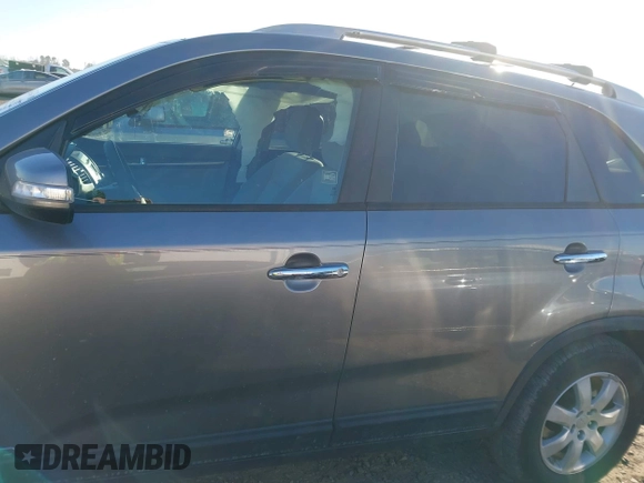 2012 Kia Sorento LX with VIN 5XYKTDA23CG297268, listed as a IAAI auction lot 41427273 with 195,578 mi miles. Bid and sale history available at carsss.com. Image 14.