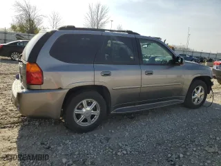 2005 GMC Envoy Denali with VIN 1GKET63M652379567, listed as a Copart auction lot 77862334 with 246,345 mi miles and Non Repairable. Bid and sale history available at carsss.com. Image 3.