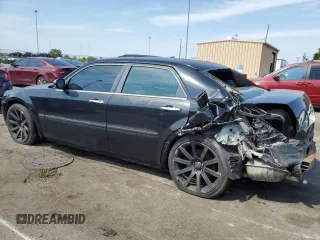 2005 Chrysler 300 with VIN 2C3JA63HX5H132776, listed as a Copart auction lot 69312144 with 136,492 mi miles and Salvage Title. Bid and sale history available at carsss.com. Image 2.
