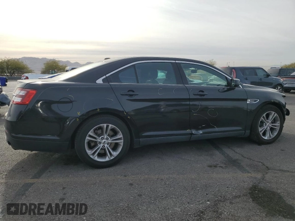 2013 Ford Taurus SEL with VIN 1FAHP2E92DG223032, listed as a Copart auction lot 84296344 with 162,960 mi miles and Salvage Title. Bid and sale history available at carsss.com. Image 3.