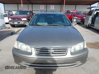 2001 Toyota Camry CE z VIN 4T1BG22K31U069513, wystawiony jako IAAI lot #42243673 z przebiegiem 137 241 mil mil oraz . Historia ofert i sprzedaży dostępna na DreamBid. Obrazek 12.