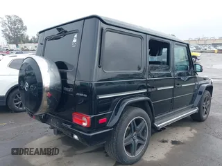 2013 Mercedes-Benz G-Class AMG G 63 with VIN WDCYC7DF1DX200684, listed as a IAAI auction lot 41513457 with 97,003 mi miles. Bid and sale history available at carsss.com. Image 4.