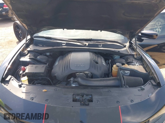 2019 Dodge Charger R/T with VIN 2C3CDXCT2KH575297, listed as a IAAI auction lot 41661339 with 119,854 mi miles and . Bid and sale history available at DreamBid. Image 10.