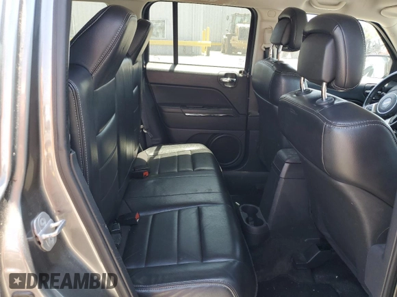 2013 Jeep Patriot Limited z VIN 1C4NJPCB7DD174669, wystawiony jako Copart lot #59312675 z przebiegiem 91 942 mil mil oraz Czysty tytuł • Clean title. Historia ofert i sprzedaży dostępna na DreamBid. Obrazek 11.