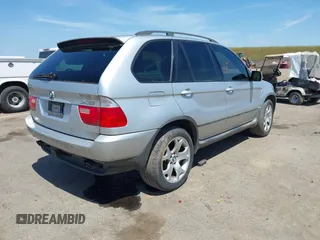 2001 BMW X5 4.4i with VIN WBAFB33511LH18797, listed as a IAAI auction lot 42075328 with 169,396 mi miles. Bid and sale history available at carsss.com. Image 4.