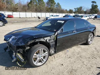 2015 BMW 7 Series 750Li xDrive with VIN WBAYF8C51FG245555, listed as a Copart auction lot 39243704 with 105,205 mi miles. Bid and sale history available at carsss.com. Image 1.