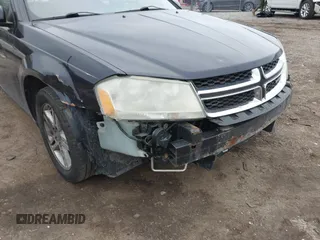 2012 Dodge Avenger SXT z VIN 1C3CDZCB7CN161508, wystawiony jako IAAI lot #41689295 z przebiegiem 184 436 mil mil oraz . Historia ofert i sprzedaży dostępna na DreamBid. Obrazek 13.