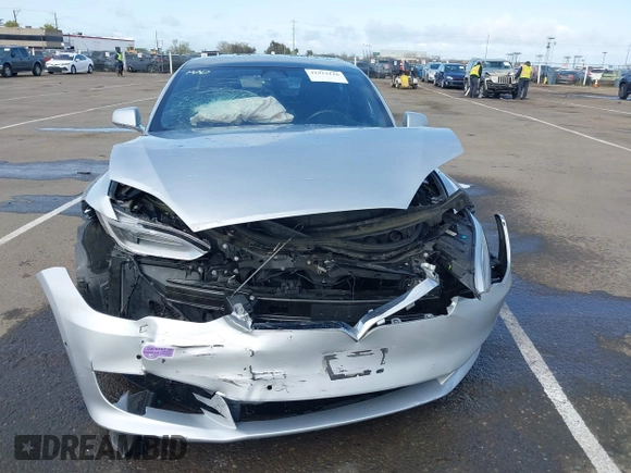 2018 Tesla Model S 75D with VIN 5YJSA1E2XJF287825, listed as a IAAI auction lot 41912116 with Not Provided miles and . Bid and sale history available at DreamBid. Image 13.