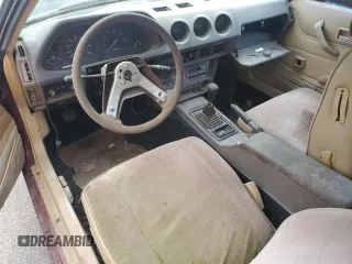 1981 Datsun 280ZX 2+2 z VIN JN1HZ06S3BX408927, wystawiony jako Copart lot #43963805 z przebiegiem 169 783 mil mil oraz Tytuł czysty. Historia ofert i sprzedaży dostępna na DreamBid. Obrazek 8.