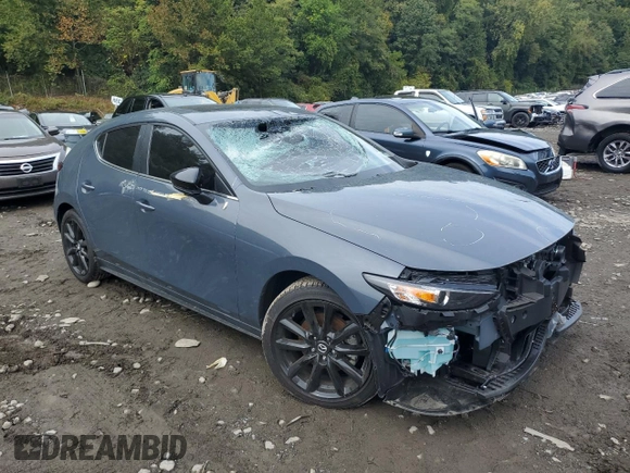 2023 Mazda 3 S Carbon Edition with VIN JM1BPBLM3P1618402, listed as a Copart auction lot 73179284 with 7,318 mi miles and Salvage title. Bid and sale history available at DreamBid. Image 4.