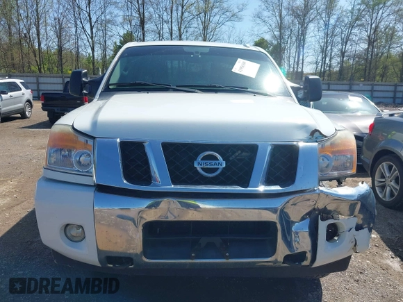 2014 Nissan Titan S with VIN 1N6AA0EC3EN502951, listed as a IAAI auction lot 41956309 with 128,464 mi miles and . Bid and sale history available at DreamBid. Image 12.