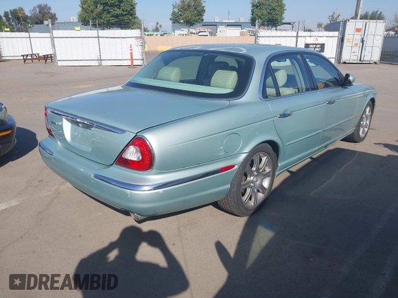2004 Jaguar XJ 8 with VIN SAJEA71CX4SG10751, listed as a IAAI auction lot 42149348 with 89,786 mi miles and . Bid and sale history available at DreamBid. Image 4.