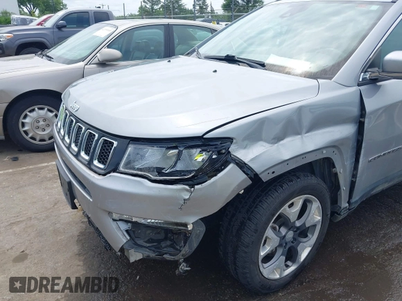 2021 Jeep Compass Limited with VIN 3C4NJCCB0MT573569, listed as a IAAI auction lot 42301154 with 106,812 mi miles and . Bid and sale history available at DreamBid. Image 18.