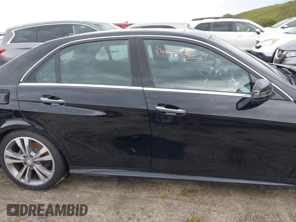 2014 Mercedes-Benz E 350 Luxury with VIN WDDHF8JB0EA907936, listed as a IAAI auction lot 40480628 with Not Provided miles and . Bid and sale history available at DreamBid. Image 13.