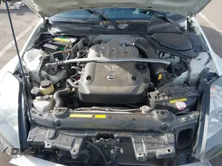 2004 Nissan 350Z Touring with VIN JN1AZ34D14M102966, listed as a IAAI auction lot 41921270 with 182,633 mi miles. Bid and sale history available at carsss.com. Image 10.