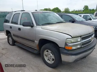 2004 Chevrolet Tahoe LS z VIN 1GNEK13ZX4R286190, wystawiony jako IAAI lot #42289911 z przebiegiem 81 889 mil mil oraz . Historia ofert i sprzedaży dostępna na DreamBid. Obrazek 1.