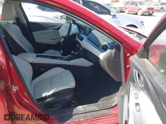 2017 Mazda 6 Grand Touring with VIN JM1GL1W52H1139776, listed as a IAAI auction lot 41671005 with 40,884 mi miles and . Bid and sale history available at DreamBid. Image 5.