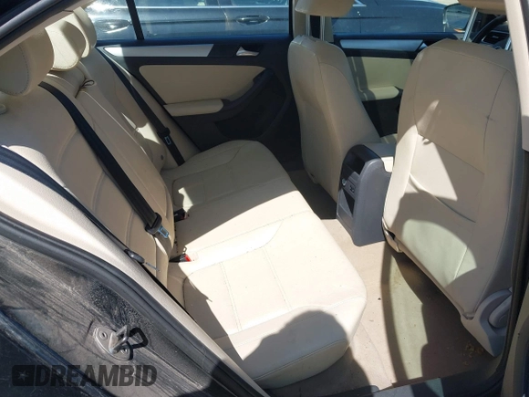 2012 Volkswagen Jetta TDI w/Premium & Nav z VIN 3VWLL7AJ7CM400382, wystawiony jako IAAI lot #42274839 z przebiegiem 150 205 mil mil oraz . Historia ofert i sprzedaży dostępna na DreamBid. Obrazek 8.