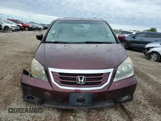 2010 Honda Odyssey Touring with VIN 5FNRL3H94AB056657, listed as a Copart auction lot 72658934 with 202,690 mi miles and Salvage title. Bid and sale history available at DreamBid. Image 5.