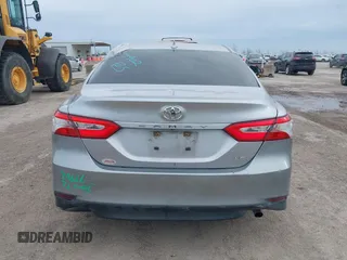 2019 Toyota Camry LE z VIN 4T1B11HK3KU769178, wystawiony jako IAAI lot #41348861 z przebiegiem 121 069 mil mil oraz . Historia ofert i sprzedaży dostępna na DreamBid. Obrazek 17.