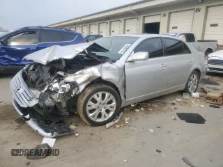 2010 Toyota Avalon XL with VIN 4T1BK3DB8AU352104, listed as a Copart auction lot 49680795 with 144,192 mi miles and Salvage Title. Bid and sale history available at carsss.com. Image 1.