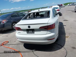 2019 Volkswagen Jetta S z VIN 3VWC57BU7KM200586, wystawiony jako IAAI lot #42609606 z przebiegiem 72 874 mil mil oraz . Historia ofert i sprzedaży dostępna na DreamBid. Obrazek 16.