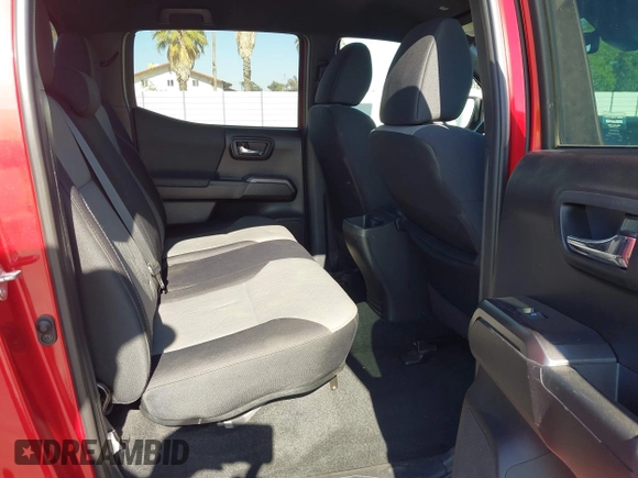 2021 Toyota Tacoma SR z VIN 5TFCZ5AN8MX247421, wystawiony jako IAAI lot #42147910 z przebiegiem 94 467 mil mil oraz . Historia ofert i sprzedaży dostępna na DreamBid. Obrazek 8.