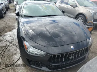 2019 Maserati Ghibli z VIN ZAM57XSA3K1319532, wystawiony jako Copart lot #74282384 z przebiegiem Nie podano mil oraz Nie do naprawy. Historia ofert i sprzedaży dostępna na DreamBid. Obrazek 5.