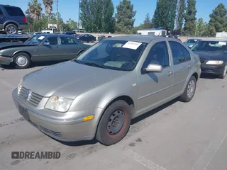 2004 Volkswagen Jetta GL z VIN 3VWRA69M64M039222, wystawiony jako IAAI lot #42262445 z przebiegiem 100 200 mil mil oraz . Historia ofert i sprzedaży dostępna na DreamBid. Obrazek 6.