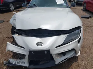 2021 Toyota Supra 2.0 with VIN WZ1DB2C0XMW043249, listed as a IAAI auction lot 42085092 with Not provided miles and . Bid and sale history available at DreamBid. Image 13.