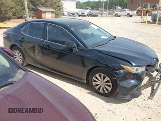 2018 Toyota Camry LE с VIN 4T1B11HK6JU067077, выставлен на аукционе IAAI как лот 42084368 с пробегом 140 893 миль миль и . История ставок и продаж доступна на DreamBid. Изображение 1.