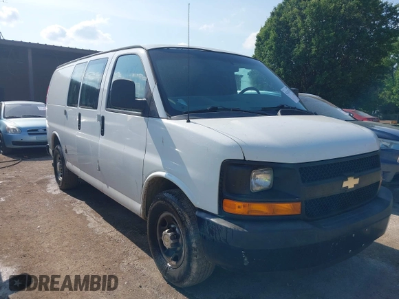 2014 Chevrolet Express Cargo Van with VIN 1GCWGFCG0E1100859, listed as a IAAI auction lot 42142748 with 182,900 mi miles. Bid and sale history available at carsss.com. Image 1.