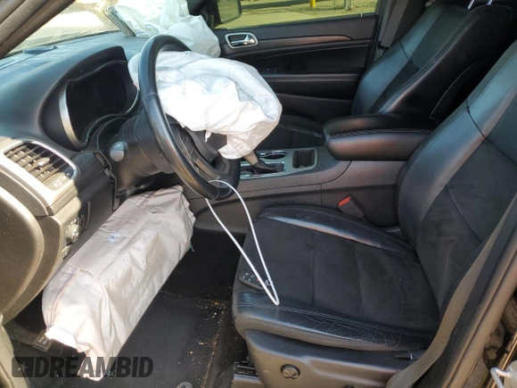 2019 Jeep Grand Cherokee Upland with VIN 1C4RJFAGXKC590227, listed as a Copart auction lot 48396355 with 104,850 mi miles and Salvage Title. Bid and sale history available at DreamBid. Image 7.