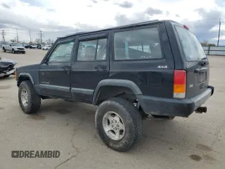 1998 Jeep Cherokee Sport with VIN 1J4FJ68S6WL188802, listed as a Copart auction lot 52094005 with 199,586 mi miles and Salvage Title. Bid and sale history available at carsss.com. Image 2.