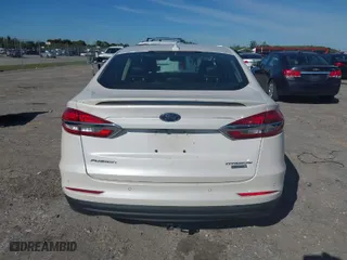 2020 Ford Fusion Hybrid Titanium with VIN 3FA6P0RU4LR182226, listed as a IAAI auction lot 41748021 with 69,234 mi miles. Bid and sale history available at carsss.com. Image 16.
