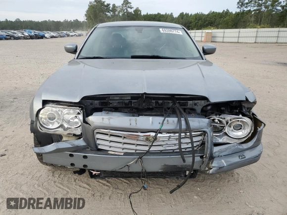 2006 Chrysler 300 C SRT8 with VIN 2C3KA73W06H372249, listed as a Copart auction lot 69399774 with 112,872 mi miles and Salvage Title. Bid and sale history available at carsss.com. Image 5.