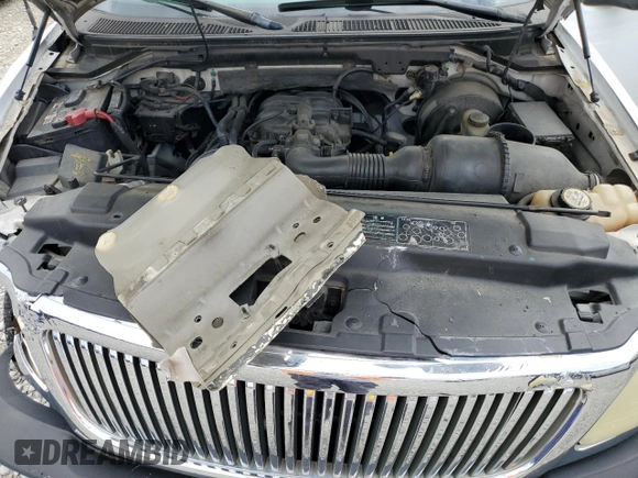 2003 Ford F-150 XL z VIN 1FTRX17283NA47526, wystawiony jako Copart lot #56548415 z przebiegiem 113 287 mil mil oraz Szkoda całkowita • Salvage title. Historia ofert i sprzedaży dostępna na DreamBid. Obrazek 11.