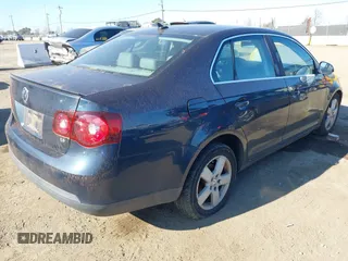 2008 Volkswagen Jetta SE with VIN 3VWRZ71K38M035479, listed as a IAAI auction lot 41399776 with 125,283 mi miles and . Bid and sale history available at DreamBid. Image 4.